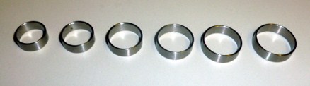 Stainless steel rings for reinforcement of rod top section